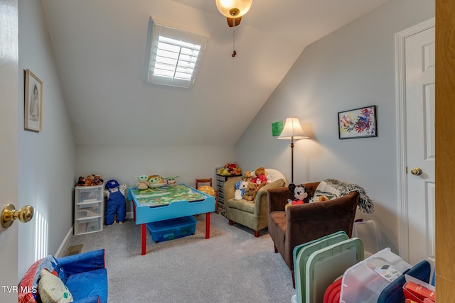 playroom featuring lofted ceiling and carpet floors