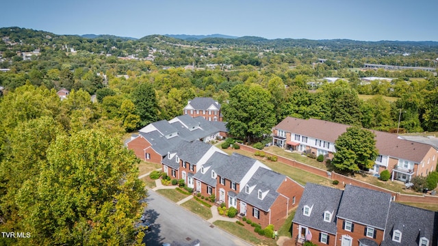 bird's eye view with a view of trees and a residential view