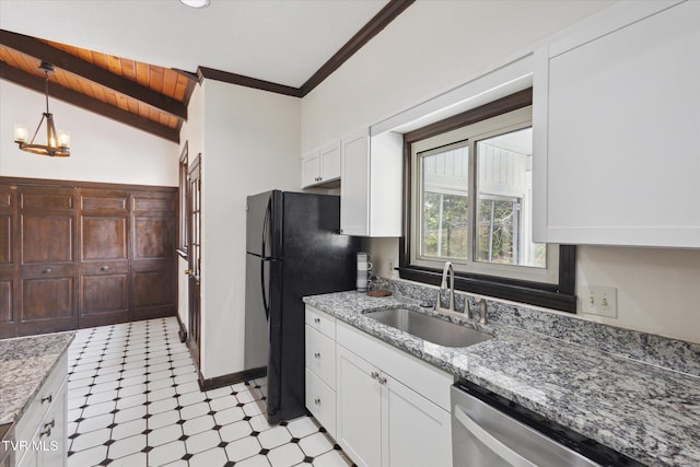 kitchen featuring a chandelier, light floors, vaulted ceiling, white cabinetry, and a sink