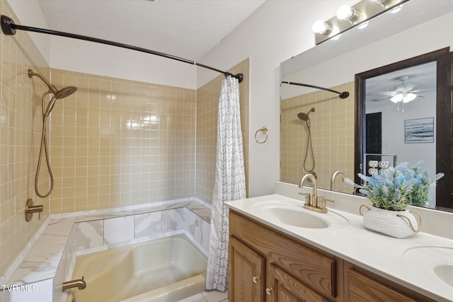 bathroom with double vanity, shower / bath combination with curtain, a textured ceiling, and a sink