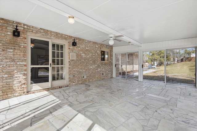 view of patio featuring ceiling fan