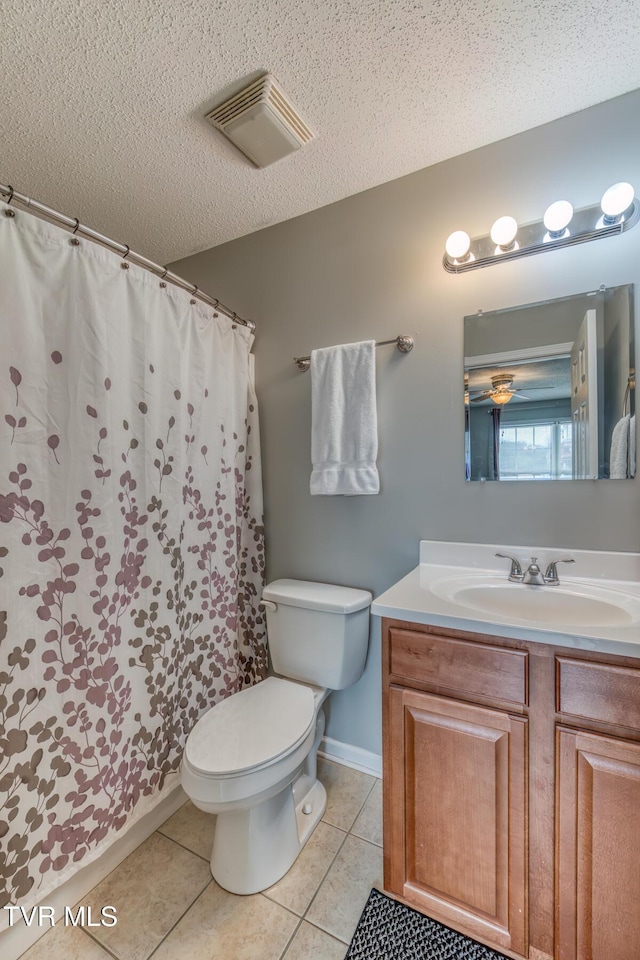 full bathroom with vanity, visible vents, a textured ceiling, tile patterned floors, and toilet