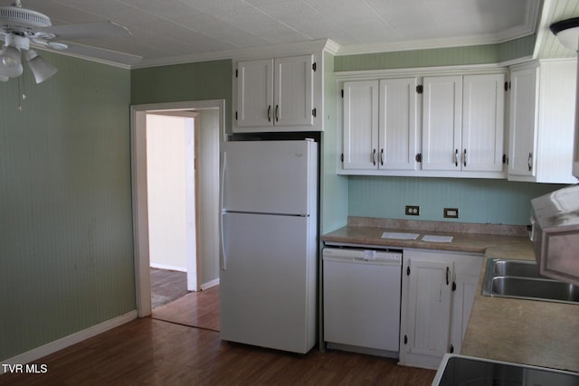 kitchen featuring dark wood finished floors, white appliances, white cabinets, and a sink