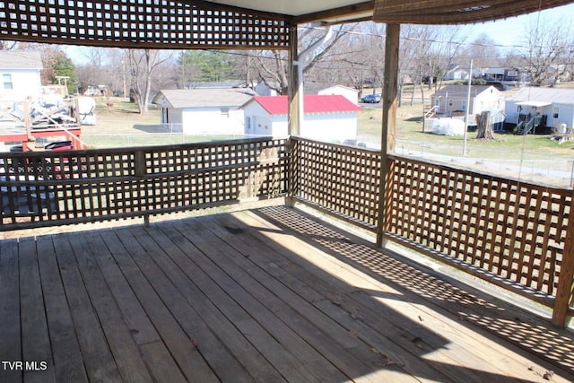 wooden deck with a residential view