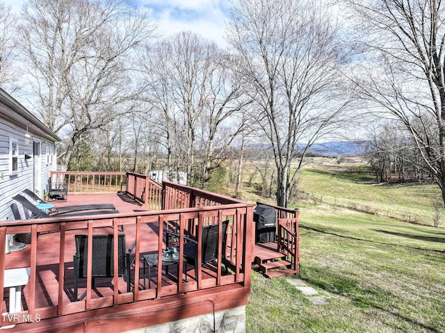 wooden deck with a yard