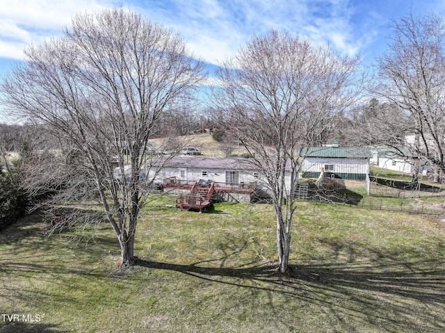 view of yard featuring a wooden deck