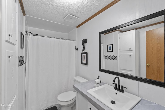 bathroom featuring curtained shower, a textured ceiling, toilet, and vanity