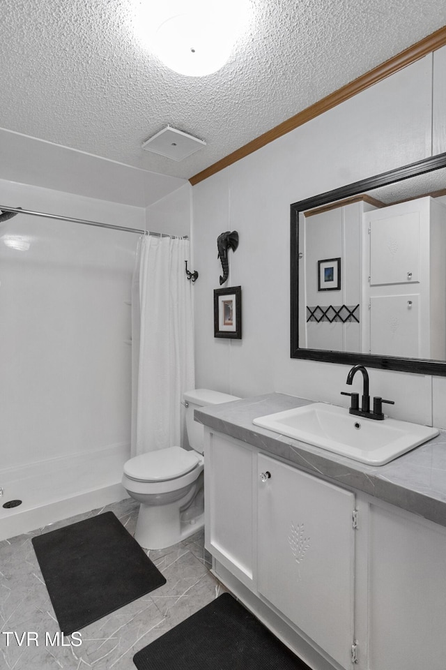 bathroom featuring toilet, marble finish floor, curtained shower, a textured ceiling, and vanity