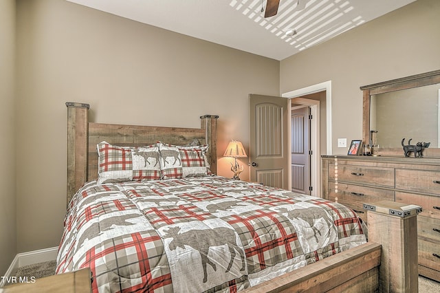 bedroom with carpet flooring and baseboards