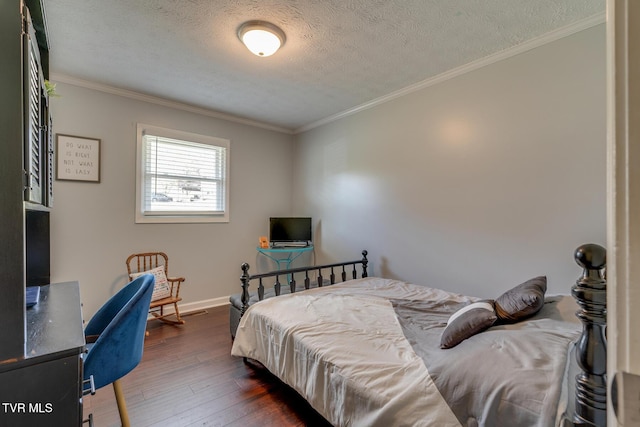 bedroom featuring crown molding, dark wood-style floors, baseboards, and a textured ceiling