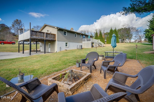 view of patio with stairway, a wooden deck, and central AC