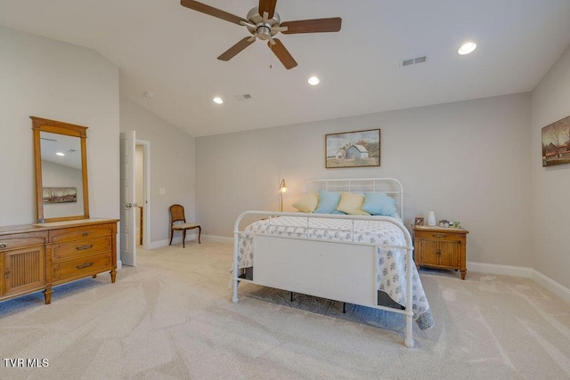 bedroom featuring lofted ceiling, recessed lighting, visible vents, and light carpet