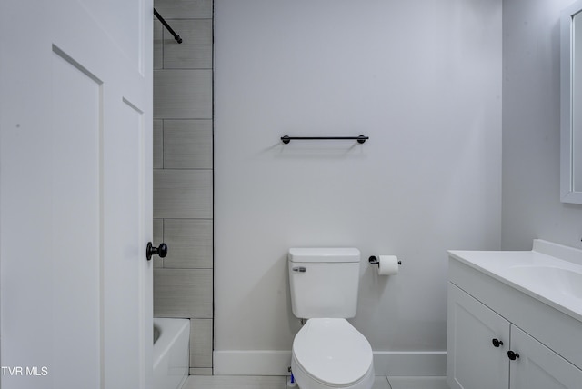 full bathroom featuring toilet, vanity, and baseboards