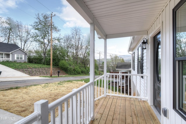 wooden deck featuring a porch