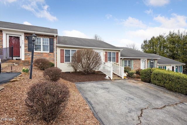 view of front of home with brick siding