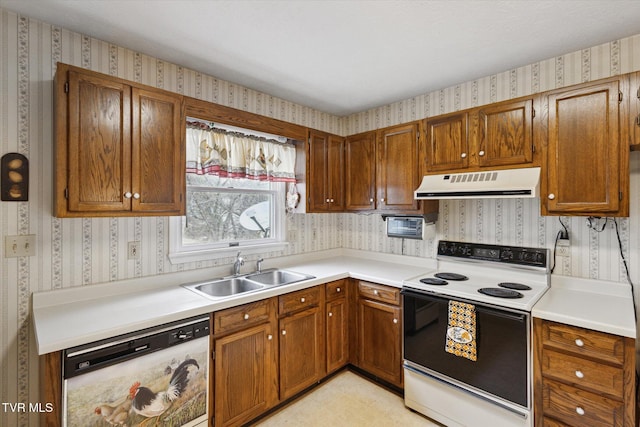 kitchen with wallpapered walls, range hood, a sink, and electric range oven