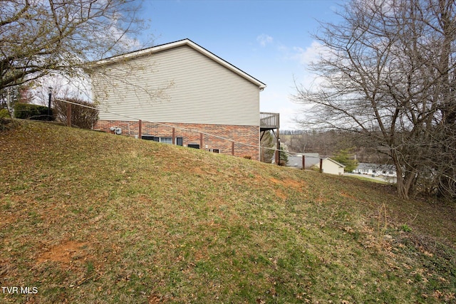 view of property exterior featuring a yard