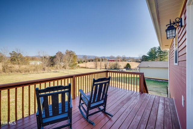 wooden deck with a yard