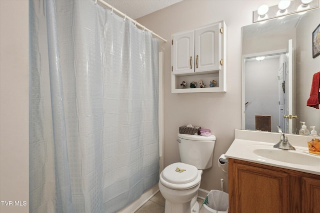 full bathroom featuring tile patterned flooring, toilet, vanity, and a shower with curtain