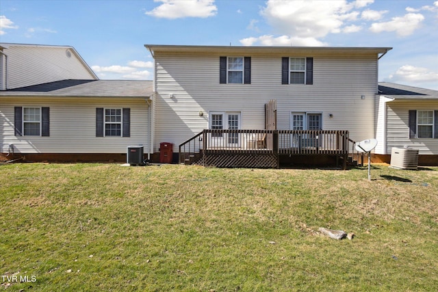 back of house with a yard, central AC unit, and a deck