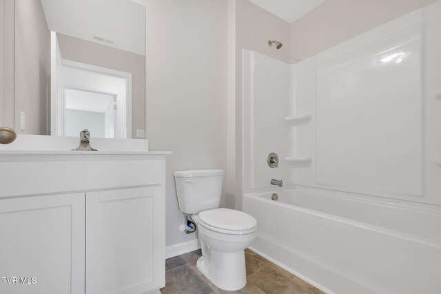 1123 Aspen Ter, Greeneville, TN 37745 - bathroom featuring toilet, bathing tub / shower combination, vanity, baseboards, and visible vents