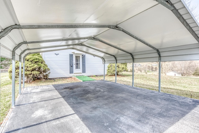 view of vehicle parking featuring a detached carport