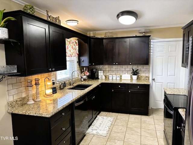 kitchen featuring black appliances, a sink, tasteful backsplash, crown molding, and light stone countertops