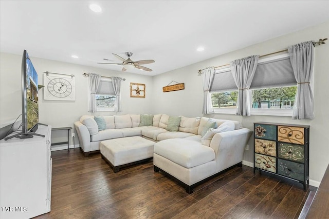 living room with recessed lighting, wood finished floors, and baseboards