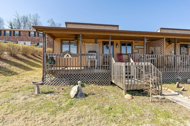 view of front of house featuring a porch and ceiling fan