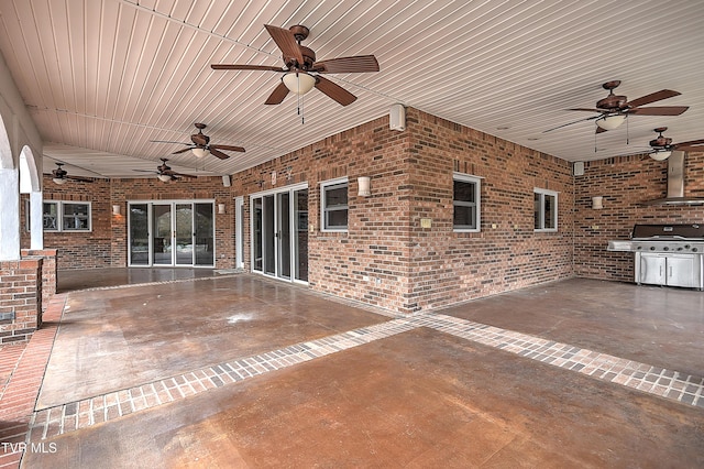 view of patio / terrace featuring a grill and ceiling fan