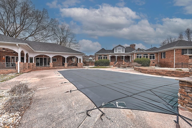 pool featuring a patio