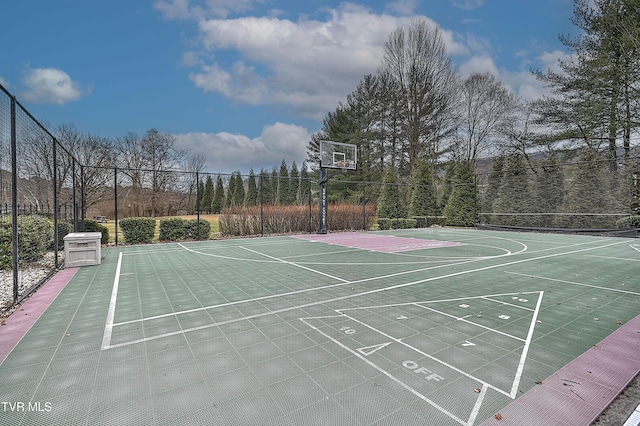 view of sport court featuring community basketball court and fence