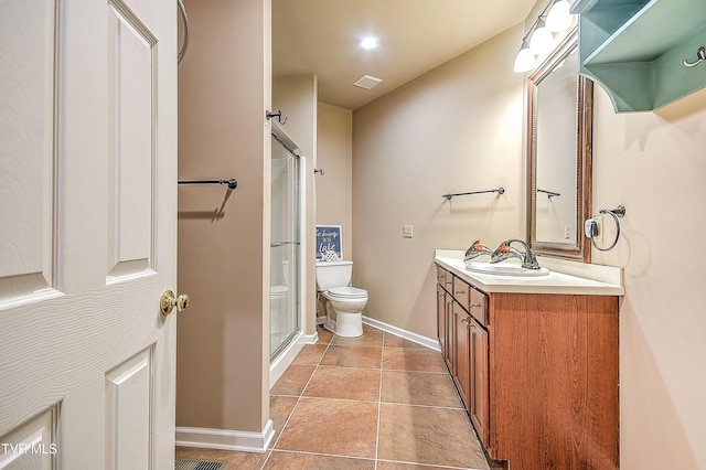 bathroom featuring visible vents, toilet, a shower stall, tile patterned flooring, and vanity