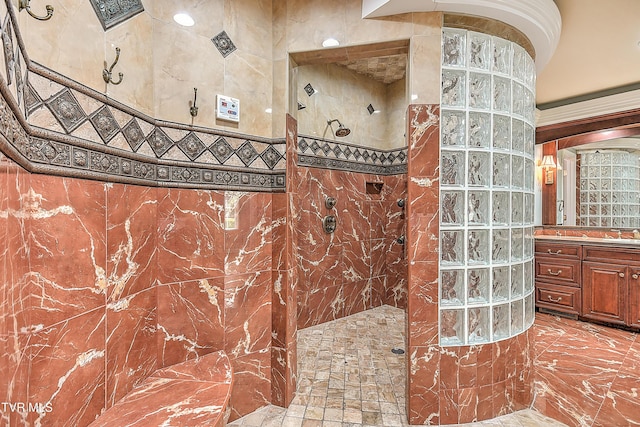 bathroom with vanity and a walk in shower