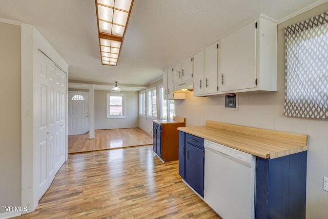 kitchen featuring dishwasher, light countertops, light wood-style floors, white cabinetry, and blue cabinets