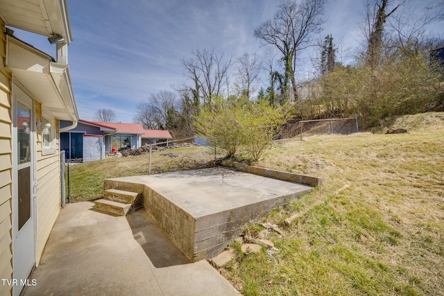 view of yard with a patio area and fence