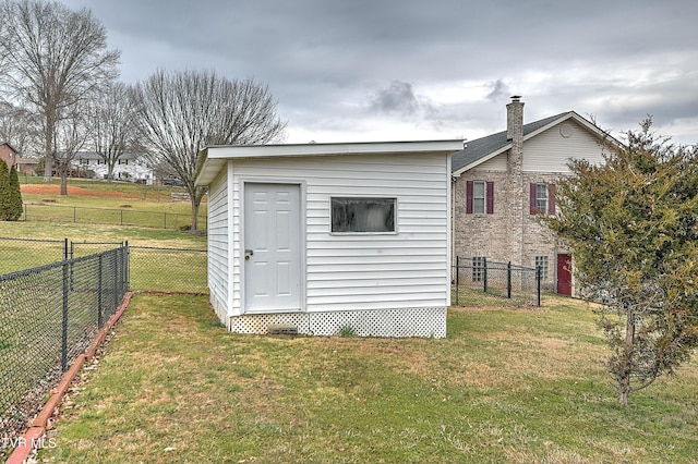 view of shed featuring a fenced backyard