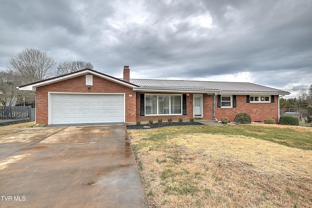 single story home featuring a front lawn, fence, metal roof, brick siding, and a chimney