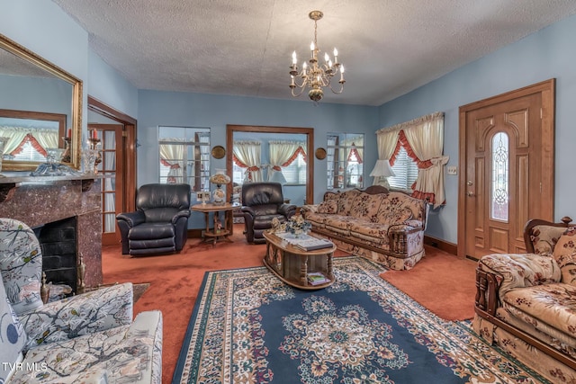 carpeted living area with a notable chandelier, baseboards, a high end fireplace, and a textured ceiling