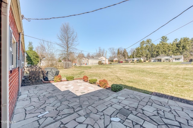 view of patio / terrace with a residential view