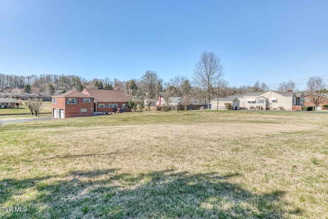 view of yard featuring a garage