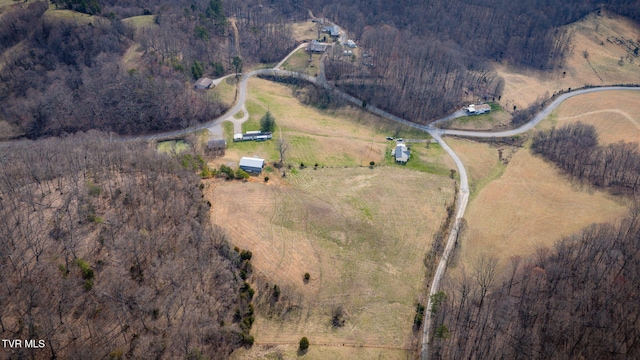 drone / aerial view with a view of trees