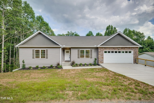 129 Stratton Pl, Kingsport, TN 37663 - ranch-style home featuring board and batten siding, concrete driveway, an attached garage, a front yard, and stone siding