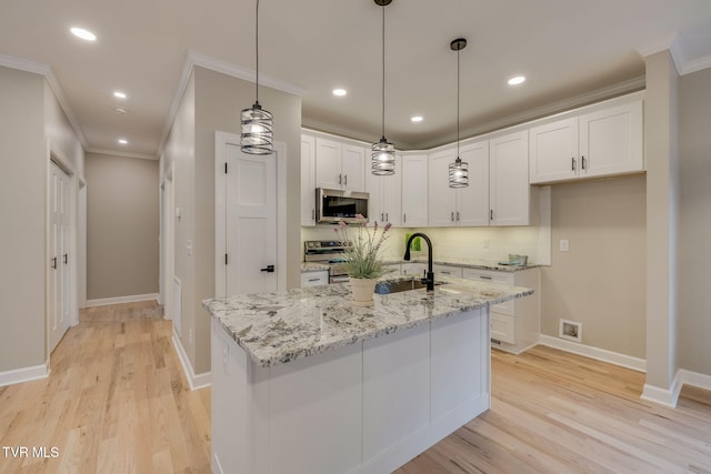 129 Stratton Pl, Kingsport, TN 37663 - kitchen featuring appliances with stainless steel finishes, ornamental molding, tasteful backsplash, white cabinets, and light wood finished floors