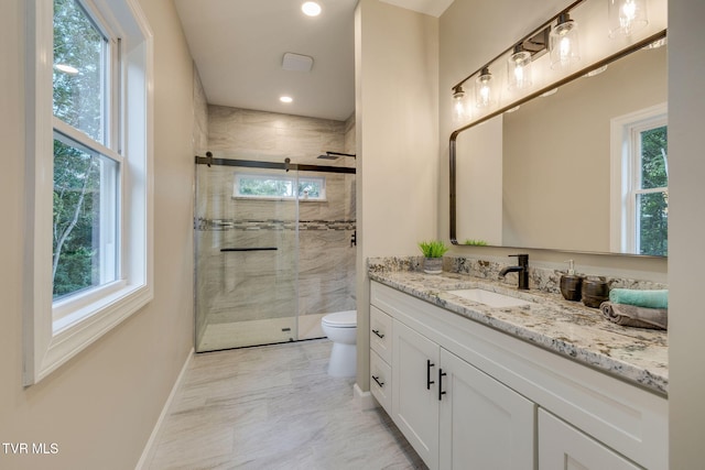 129 Stratton Pl, Kingsport, TN 37663 - full bathroom featuring healthy amount of natural light, vanity, marble finish flooring, a stall shower, and recessed lighting