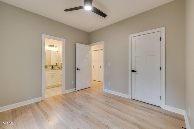 129 Stratton Pl, Kingsport, TN 37663 - unfurnished bedroom with light wood-type flooring, connected bathroom, and ceiling fan