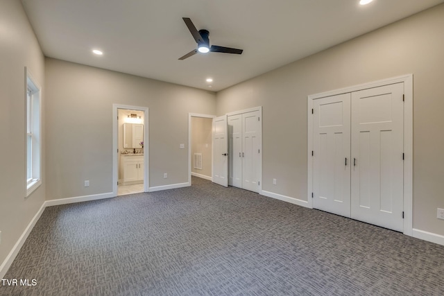 129 Stratton Pl, Kingsport, TN 37663 - unfurnished bedroom featuring multiple closets, recessed lighting, carpet floors, connected bathroom, and ceiling fan