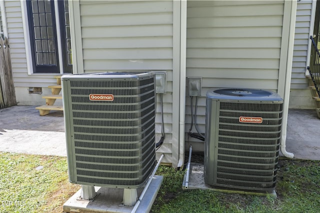 exterior details featuring crawl space and central air condition unit