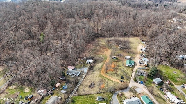 aerial view featuring a view of trees