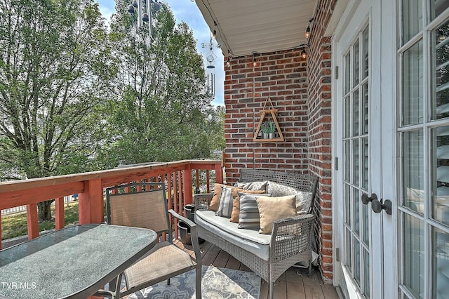 view of wooden balcony with a deck